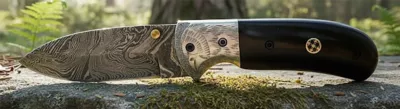 Damascus Blade Folding Knife with Sculpted Eagle Bolster & Black Horn Handle – 12 cm Handle, Wooden Box Included