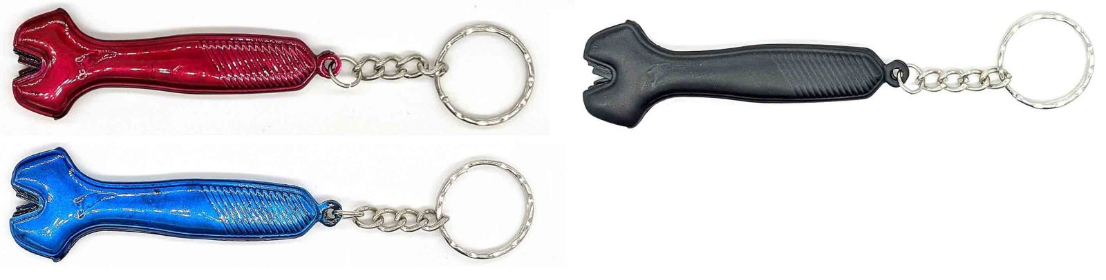 Black, red and blue wrench-shaped tungsten carbide sharpener keyrings shown together